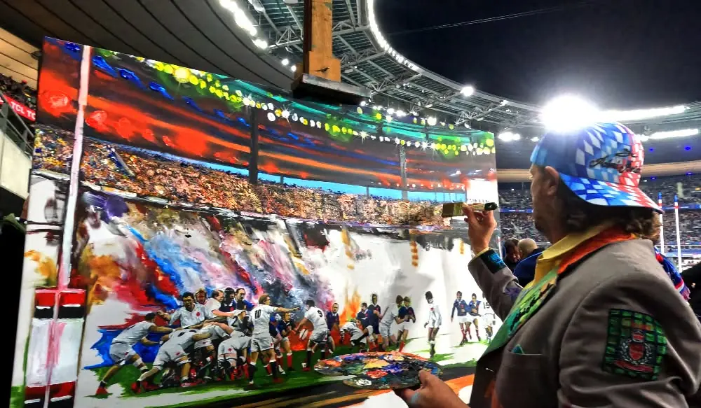 Rémi Bertoche peignant en direct une œuvre consacrée à France Rugby au Stade de France